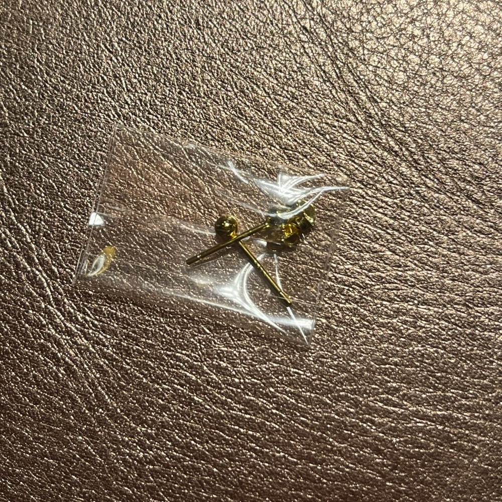 Gold plated tiny ball post earrings. Unworn
